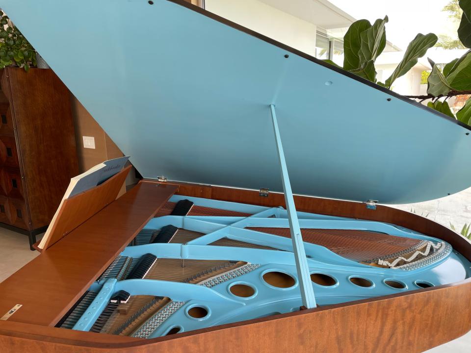 The 1958 Bösendorfer Grand Piano features a pop of color under its lid.