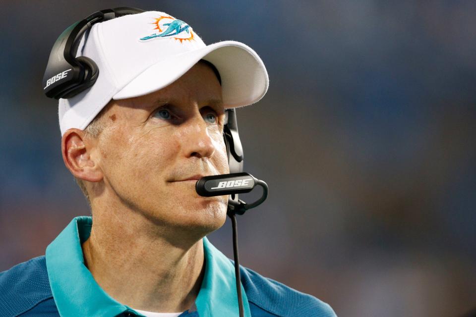 FILE - In this Aug. 22, 2015, file photo, then-Miami Dolphins head coach Joe Philbin watches the action against the Carolina Panthers during the second half of an NFL preseason football game in Charlotte, N.C. The Green Bay Packers opened on-field work in their offseason program this week, an especially important time for a team that has had a lot of changes since the end of a 7-9 season. On offense, Aaron Rodgers is healthy again after missing much of last season with a broken collarbone. The Packers welcomed back Joe Philbin as their offensive coordinator. (AP Photo/Bob Leverone, File)