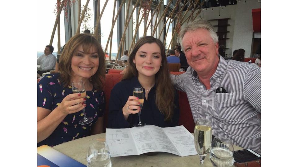 family posing for lunch 