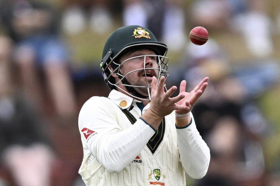 Australia's Travis Head catches out New Zealand's Blundell on the fourth day of their cricket test match in Wellington, New Zealand, Sunday, March 3, 2024. (Andrew Cornaga/Photosport via AP)