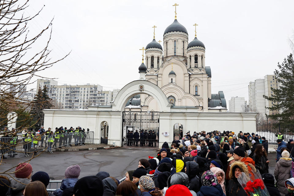 People gather outside the Soothe My Sorrows church as they wait for a funeral service and a farewell ceremony for Russian opposition politician Alexei Navalny in Moscow, Russia, March 1, 2024.  (Reuters)
