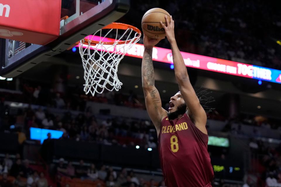 Cleveland Cavaliers forward Lamar Stevens dunks the ball during the first half of an NBA basketball game against the Miami Heat, Wednesday, March 8, 2023, in Miami. (AP Photo/Wilfredo Lee)