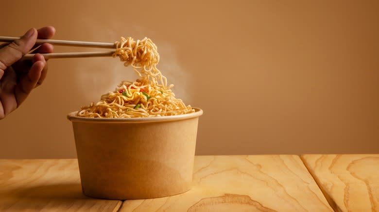 Twirling noodles with chopsticks