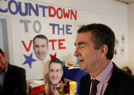 FILE PHOTO: Virginia Lieutenant Governor Ralph Northam, who is campaigning to be elected as the state's governor, greets supporters during a rally in Richmond, Virginia, U.S. on November 6, 2017. REUTERS/Julia Rendleman/File Photo