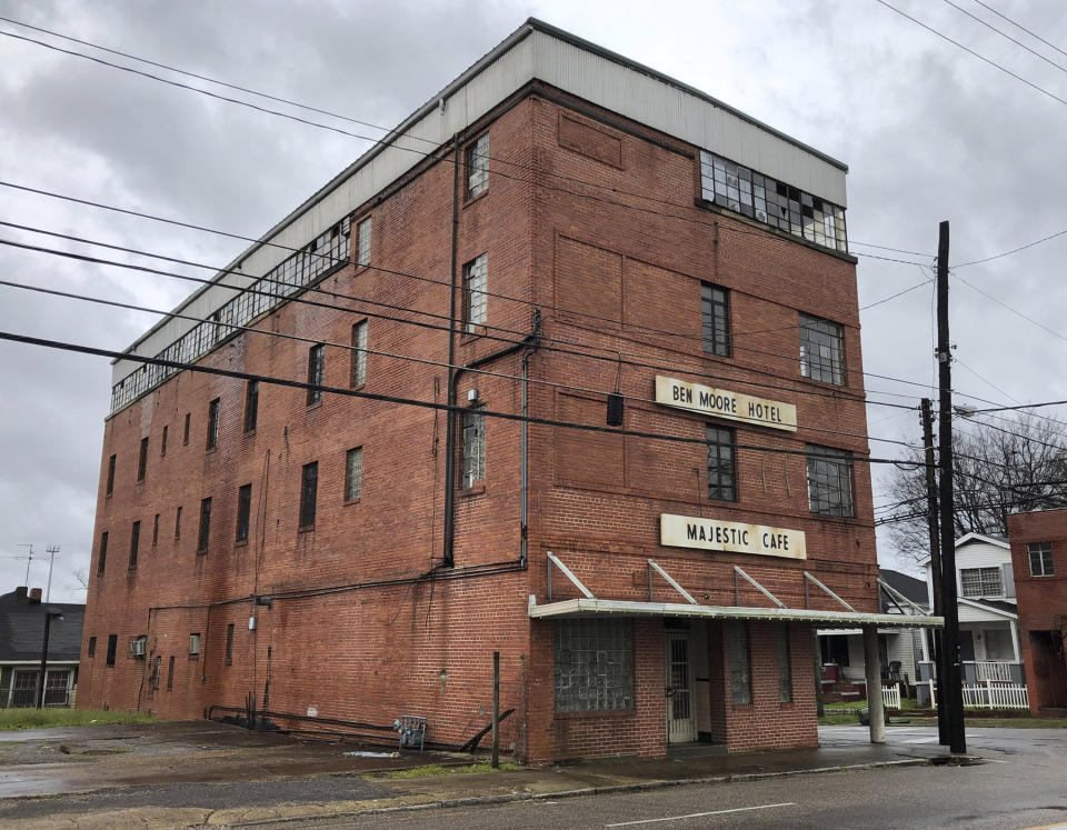 This Feb. 12, 2019 photo shows the exterior of the old Ben Moore Hotel, once mentioned in the "Green Book" for black travelers, in Montgomery, Alabama. The Oscar-nominated interracial road trip movie "Green Book" has spurred interest in the real guidebook that helped black travelers navigate segregated America. The hotel, located near Alabama's Capitol, is abandoned. (AP Photo/Jay Reeves)