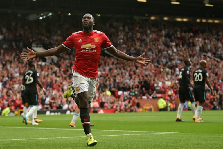 Manchester United's striker Romelu Lukaku celebrates scoring his team's second goal during the English Premier League football match against West Ham United August 13, 2017