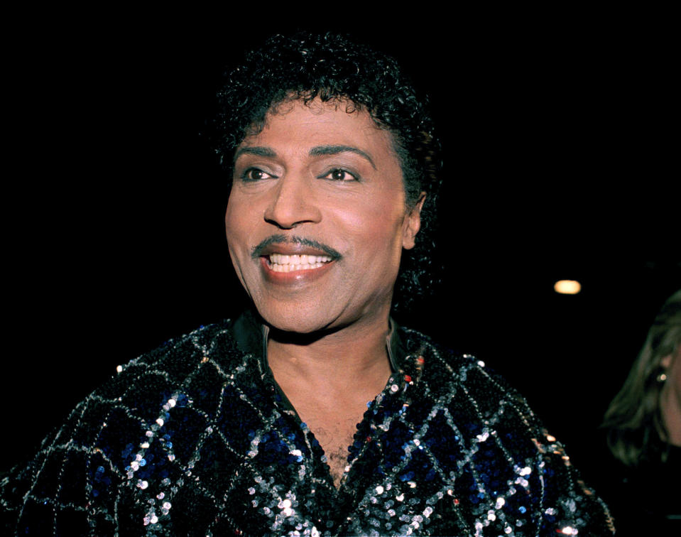 FILE - This Nov. 13, 1986 photo shows Little Richard in Los Angeles. Little Richard, the self-proclaimed “architect of rock ‘n’ roll” whose piercing wail, pounding piano and towering pompadour irrevocably altered popular music while introducing black R&B to white America, has died Saturday, May 9, 2020. (AP Photo/Mark Avery, File)