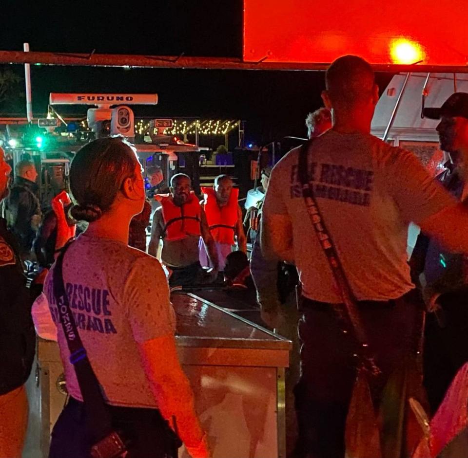 More than a dozen Haitian migrants were rescued Monday after they jumped into the ocean near Islamorada off the Florida Keys when their sailboat ran aground.