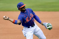 New York Mets shortstop Francisco Lindor is unable to throw out Houston Astros' Freudia Nova at first during the third inning of a spring training baseball game Tuesday, March 2, 2021, in Port St. Lucie, Fla. (AP Photo/Jeff Roberson)