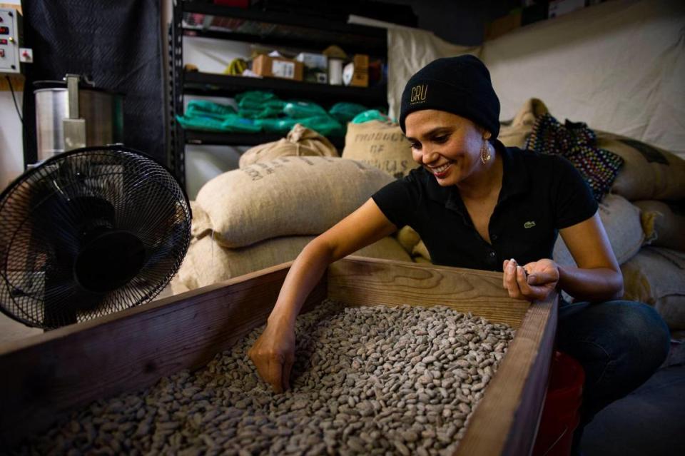 Cru Chocolate’s Karla McNeil-Rueda sorts cacao in 2020 before making chocolate bars for her home-based business. Jason Pierce/Sacramento Bee file