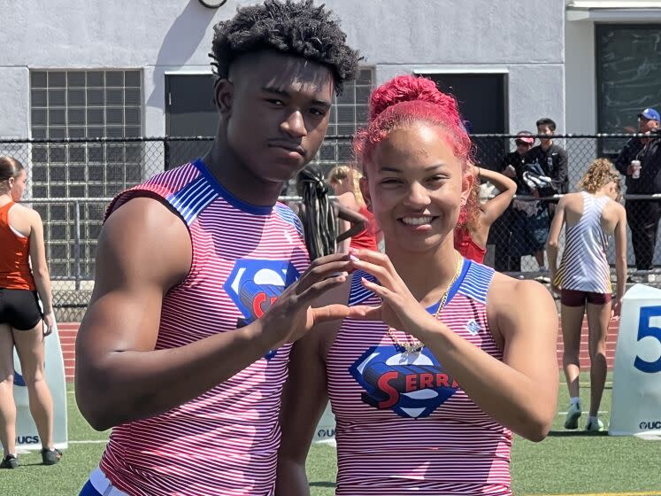 Gardena Serra's Rodrick Pleasant (left) and Brazil Neal, defending state champions in the 200.