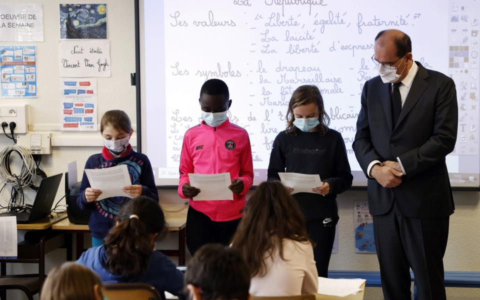 French Prime Minister Jean Castex (R) attends a homage to slained French history teacher Samuel Paty, at a school in Conflans-Sainte-Honorine - THOMAS COEX/POOL/EPA-EFE/Shutterstock