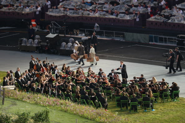 LONDON, ENGLAND - JULY 27: An orchestra plays during the Opening Ceremony of the London 2012 Olympic Games at the Olympic Stadium on July 27, 2012 in London, England. (Photo by Ronald Martinez/Getty Images)