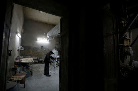 Hosni Faris, the pioneer of the mannequin industry in Egypt, works at his old workshop in Cairo, Egypt, March 24, 2017. REUTERS/Amr Abdallah Dalsh