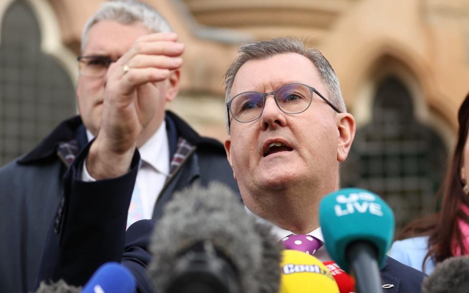 Sir Jeffrey Donaldson MP speaks to the media outside the Culloden Hotel in Belfast - Liam McBurney/PA
