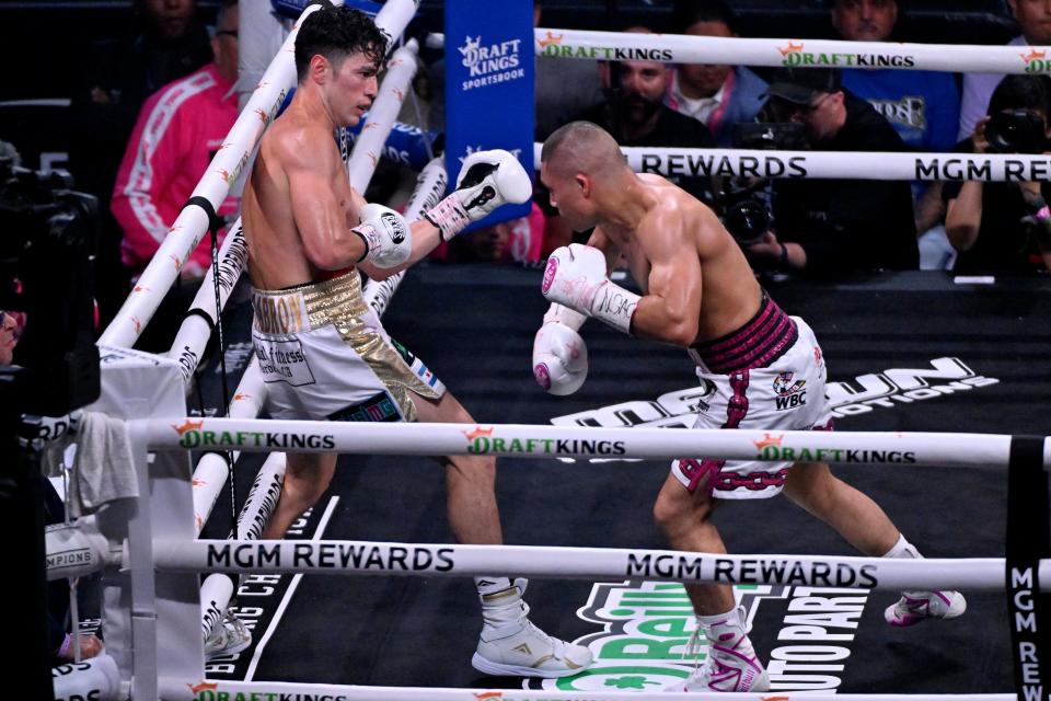 Cruz pins Cabrera against the ropes (AP)