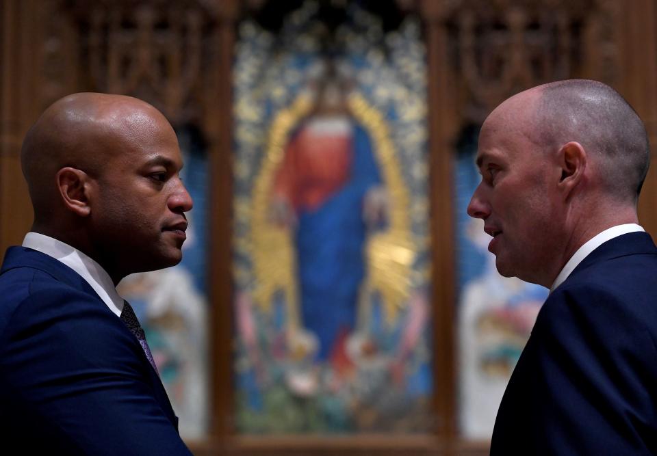 Democratic Gov. Wes Moore of Maryland and Republican Gov. Spencer Cox of Utah.