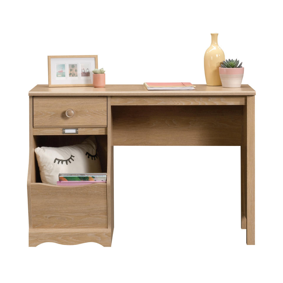 This desk comes in either a Dover oak or painted white finish. It features serious storage space, including a drawer for notebooks and colored pencils and a bin for books. <a href="https://fave.co/3hluRD6" target="_blank" rel="noopener noreferrer">Find it for $110 at Walmart</a>.