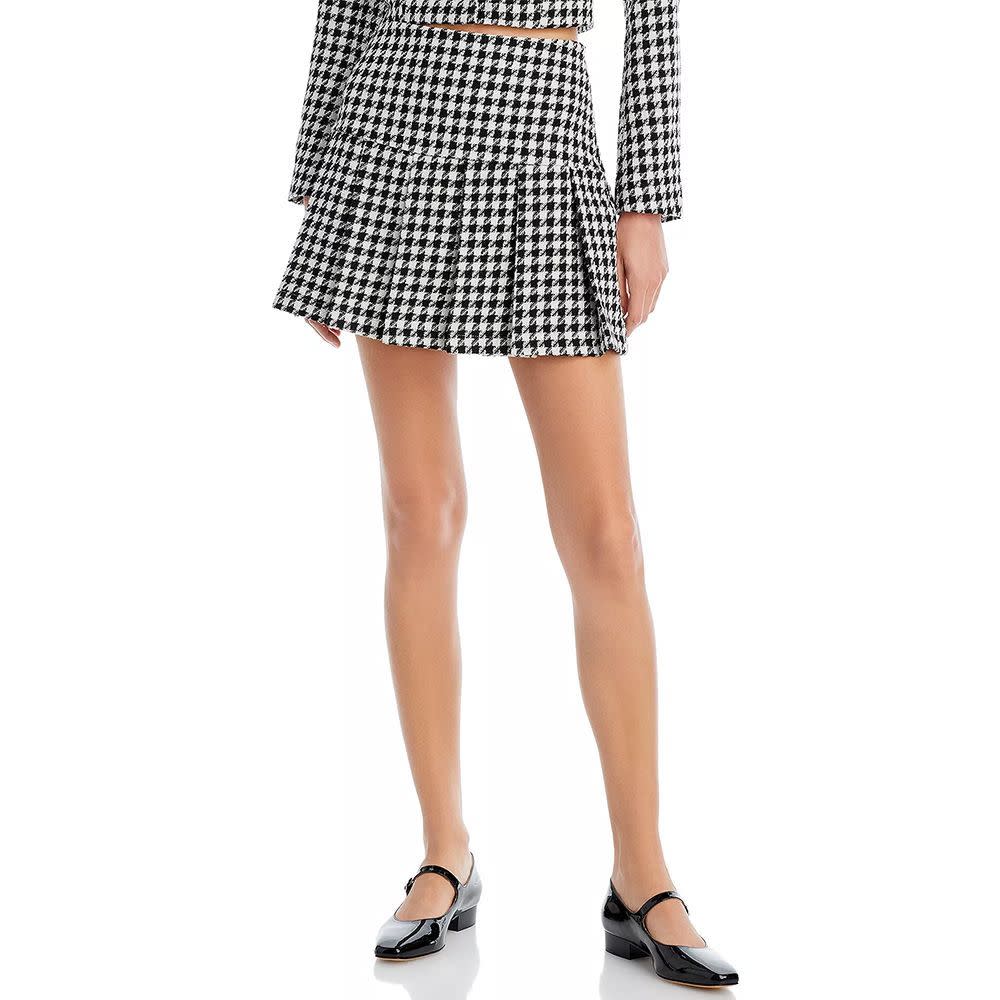 <p><a href="https://go.redirectingat.com?id=74968X1596630&url=https%3A%2F%2Fwww.bloomingdales.com%2Fshop%2Fproduct%2Faqua-houndstooth-mini-skirt-100-exclusive%3FID%3D4791394&sref=https%3A%2F%2F" rel="nofollow noopener" target="_blank" data-ylk="slk:Shop Now;elm:context_link;itc:0;sec:content-canvas" class="link rapid-noclick-resp">Shop Now</a></p><p>Houndstooth Mini Skirt </p><p>bloomingdales.com</p><p>$78.00</p>