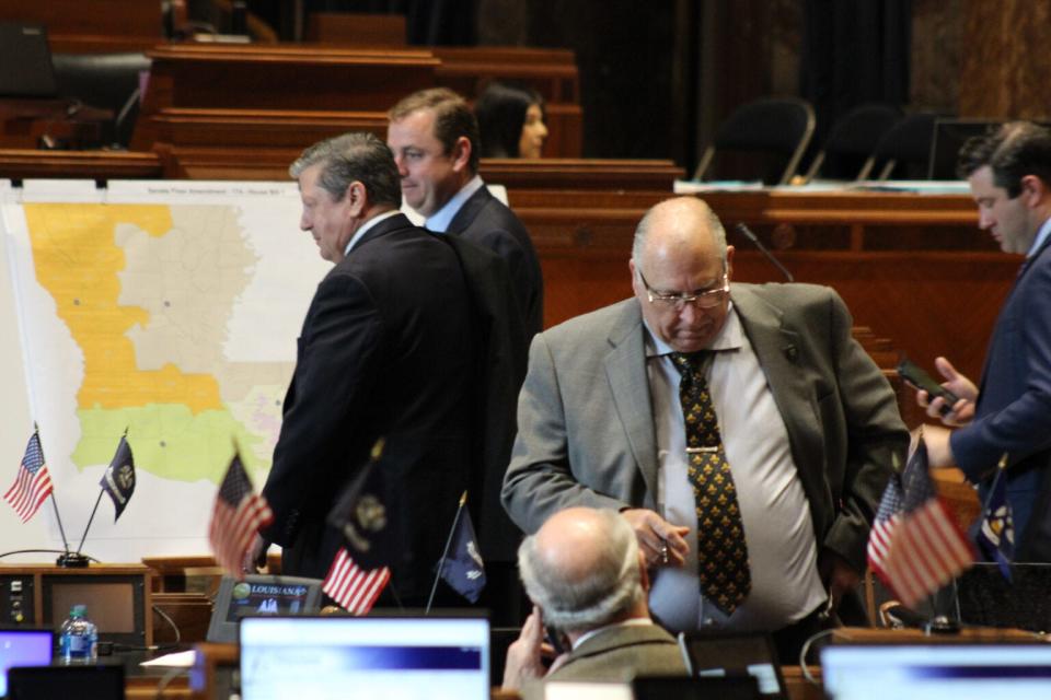 Sen. Mike Fesi (front, right), R-Houma, and other Louisiana legislators discuss a redistricting map Feb. 18 at the state Capitol. (Wes Muller/Louisiana Illuminator)