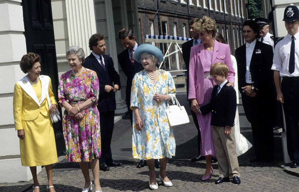 Queen Elizabeth the Queen Mother, accompanied by Princess Margaret, Queen Elizabeth ll, Diana, Princess of Wales and Prince Harry, greets the public outside Clarence House on her 92nd birthday on August 4, 1992 in London, England