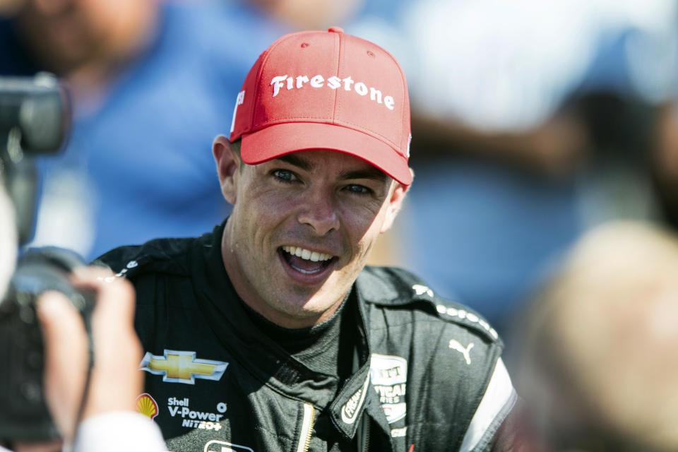 Scott McLaughlin smiles after his victory at the Grand Prix of Portland IndyCar auto race at the Portland International Raceway in Portland, Ore., on Sunday, Sept. 4, 2022. (Naji Saker/The Oregonian via AP)