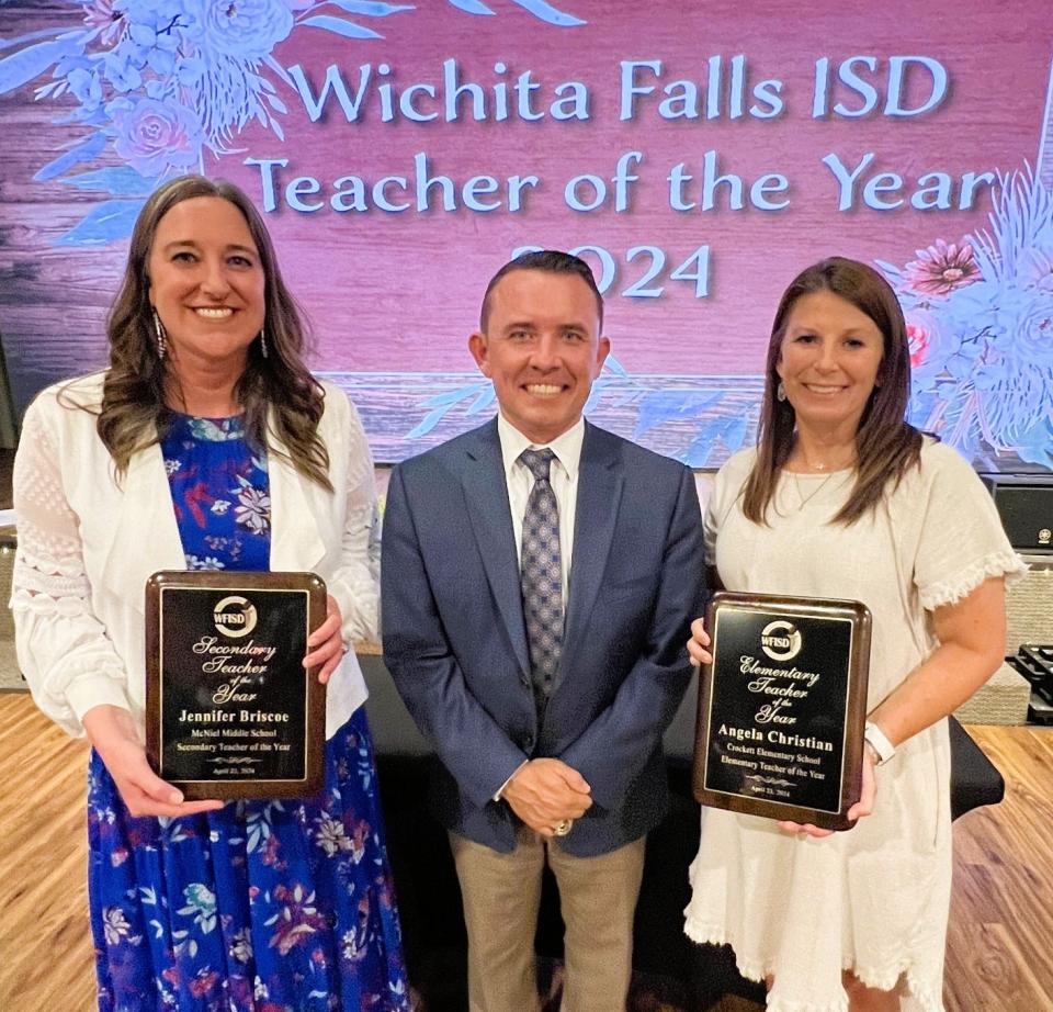 Jennifer Briscoe, left, Dr. Donny Lee, who is the Wichita Falls ISD superintendent, and Angela Christian celebrate at the April 23 WFISD Teacher of the Year Banquet. Briscoe of McNiel Middle School was named 2024 Secondary Teacher of the Year and Christian of Crockett Elementary School was named 2024 Elementary Teacher of the Year.