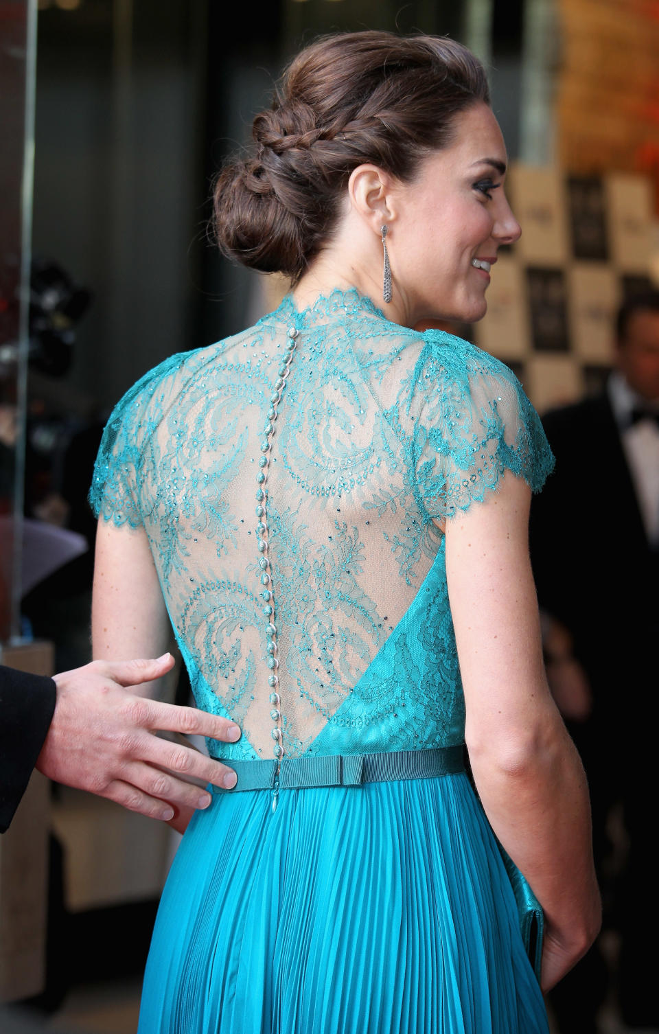 The stunning dress is perfectly tailored to Kate’s slim body, has a daring lace back and an almost mermaid-like glow when she walks. Photo: Getty Images