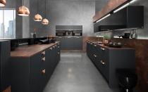 <p>Grey flooring in a kitchen can look incredibly sharp. If you're brave enough, why not match the wall colour in the same shade and accessorise with pops of gold.</p><p>'A dark grey will contrast with stainless steel or copper kitchen equipment and the finished look will be less stark than a white shade. The same dark greys also look great around a window frame, as it allows the eye to be drawn to the view beyond. If you make a bold choice, take time to choose the right shade and go with your heart,' explains Nelly Hall, Brand Director at <a href="https://www.mandlpaints.com/" rel="nofollow noopener" target="_blank" data-ylk="slk:M&L Paints;elm:context_link;itc:0;sec:content-canvas" class="link ">M&L Paints</a>. <br></p><p><strong>READ MORE: </strong><a href="https://www.housebeautiful.com/uk/lifestyle/property/a21726908/detached-house-for-sale-sussex-tennis-court-gardens/" rel="nofollow noopener" target="_blank" data-ylk="slk:Beautiful detached house comes with tennis courts and lush gardens;elm:context_link;itc:0;sec:content-canvas" class="link ">Beautiful detached house comes with tennis courts and lush gardens</a></p><p>• Shop the look at <a href="https://www.rationalgb.com/" rel="nofollow noopener" target="_blank" data-ylk="slk:Rational Kitchens;elm:context_link;itc:0;sec:content-canvas" class="link ">Rational Kitchens </a></p>