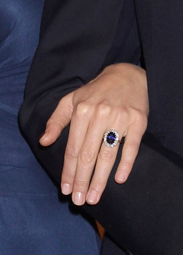 LONDON, ENGLAND - NOVEMBER 16: A close up of Kate Middleton's engagment ring as she and Prince William pose for photographs in the State Apartments of St James Palace on November 16, 2010 in London, England. After much speculation, Clarence House today announced the engagement of Prince William to Kate Middleton. The couple will get married in either the Spring or Summer of next year and continue to live in North Wales while Prince William works as an air sea rescue pilot for the RAF. The couple became engaged during a recent holiday in Kenya having been together for eight years. (Photo by Chris Jackson/Getty Images)