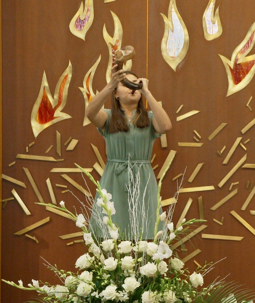 Temple Emanu-El's Maxine Mintz sounds the shofar – the ritually prepared ram’s horn traditionally blown on Rosh Hashanah, the Jewish new year – during services on Sept. 15. The High Holiday season concludes at sundown on Yom Kippur, the Day of Atonement, on Sept. 25. Temple Emanu-El also has kicked off its annual High Holiday Food Drive to benefit All Faiths Food Bank. For more, visit sarasotatemple.org/social-action.html.