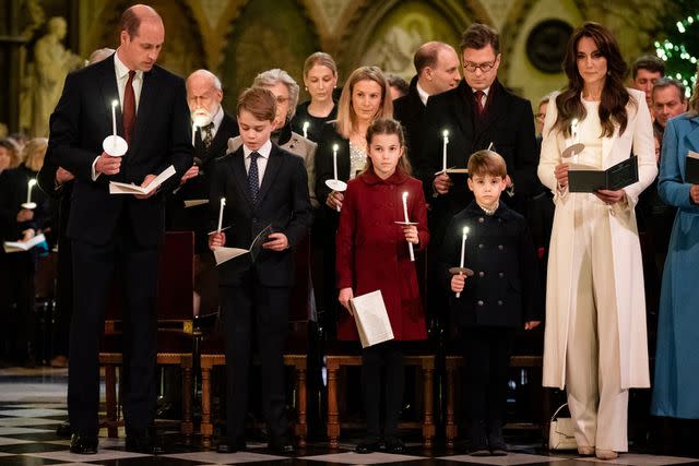 <p>Aaron Chown - WPA Pool/Getty</p> Prince William, Prince George, Princess Charlotte, Prince Louis and Kate Middleton at a Christmas concert on December 8, 2023