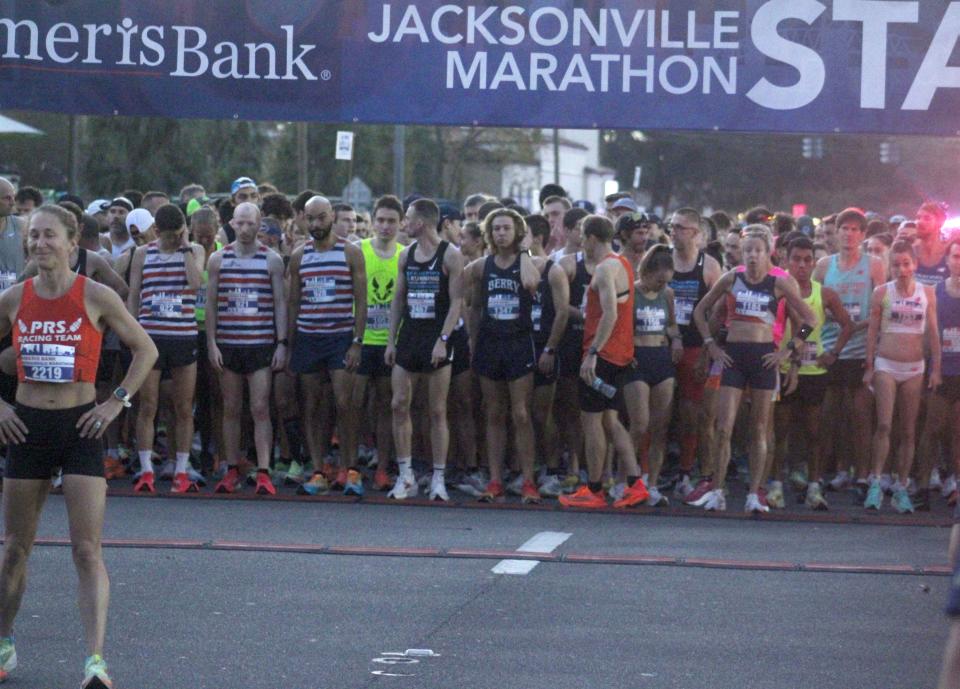 Runners prepare to break from the starting line at the Ameris Bank Jacksonville Marathon on December 10, 2023. [Clayton Freeman/Florida Times-Union]