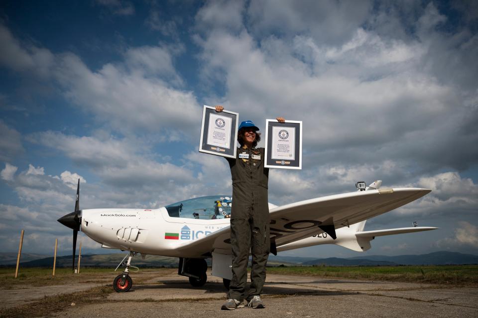 Mark Rutherford, the youngest person to fly solo around the world lands on the runway in Radomir, Bulgaria, and is greeted by his family and fans after completing his flight. The 17-year-old received a Guinness World Record certificate for his achievement.