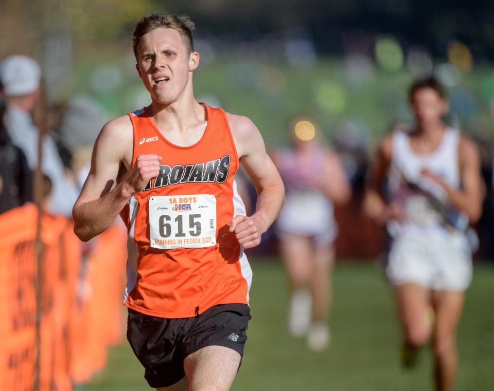 Elmwood senior Isaiah Hill cruises to a fifth-place finish in the Class 1A boys state cross country championship Saturday, Nov. 4, 2023 at Detweiller Park in Peoria, leading the Trojans to a third-place team finish.