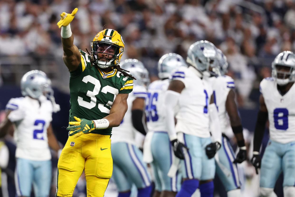 Green Bay Packers running back Aaron Jones (33) reacts against the Dallas Cowboys during the first quarter for the NFC wild card game on Sunday, Jan. 14, 2024, at AT&T Stadium.