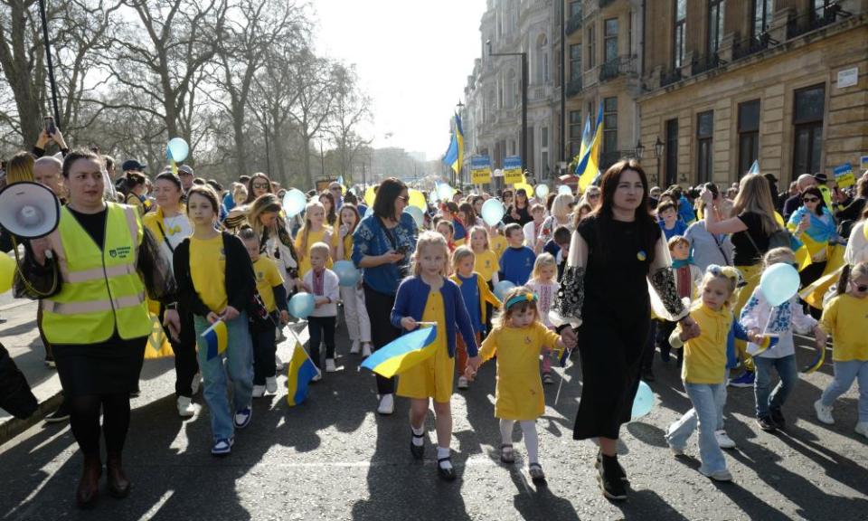 Ukrainian mothers and children lead the “London Stands With Ukraine” March.