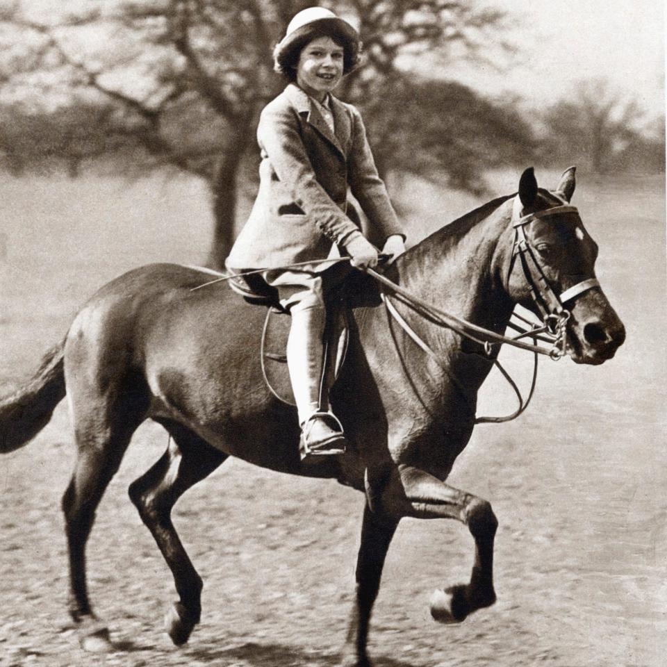 The Queen as a little girl riding in Windsor - Hulton