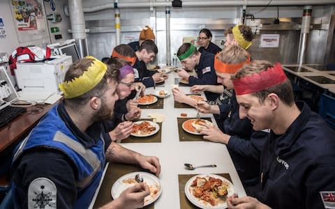 Crew onboard HMS St Albans enjoy a Christmas Eve curry while on patrol 2017 - Credit: LPHOT Seeley/Royal Navy