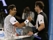 Britain's Andy Murray (R) and Spain's David Ferrer shake hands after Murray won their quarter-final match at the Australian Open tennis tournament at Melbourne Park, Australia, January 27, 2016. REUTERS/Issei Kato