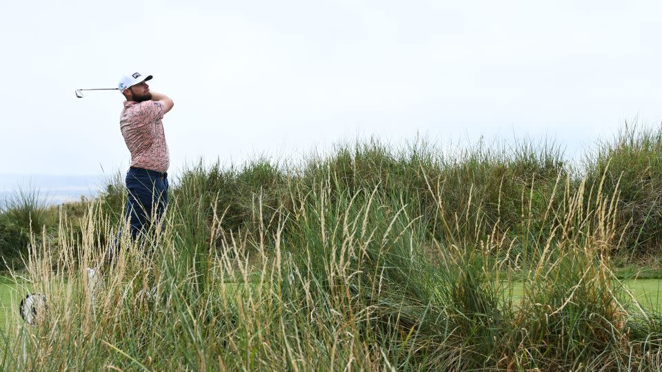 England's Tyrrell Hatton plays the 13th hole. - Tom Shaw/R&A/Getty Images