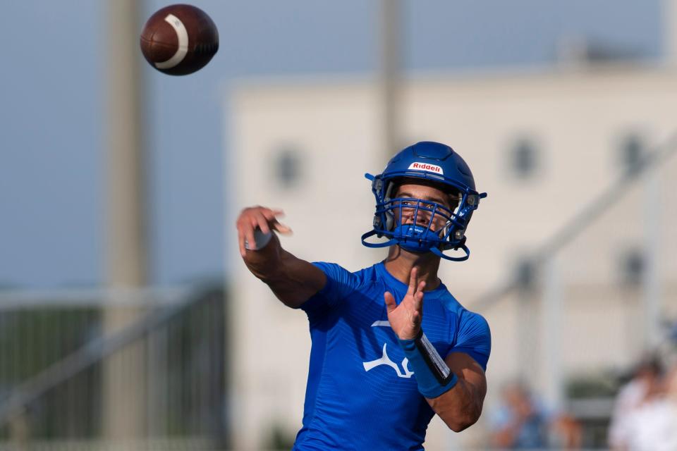 Barron Collier's Thomas Mooncotch (10) throws a pass during the warmup of the FHSAA non-district football game between Palmetto Ridge and Barron Collier, Friday, Sept. 2, 2022, at Barron Collier High School in Naples, Fla.