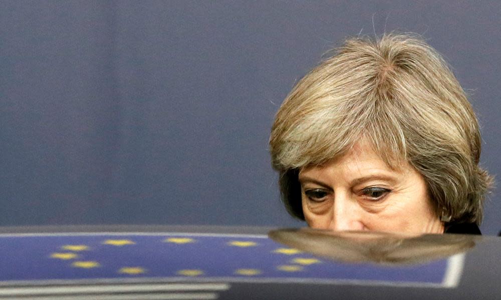 Theresa May and reflection of EU flag