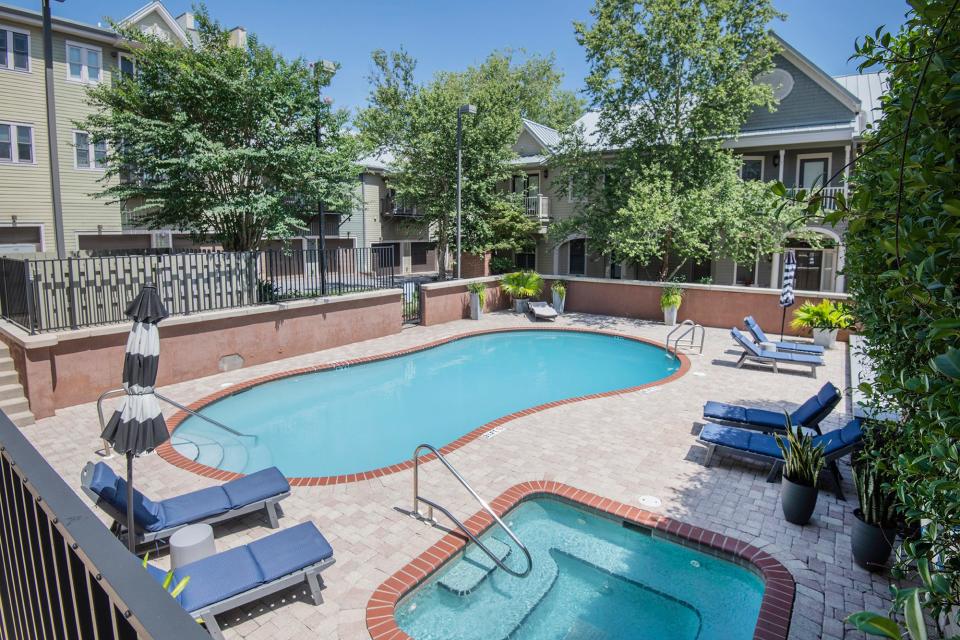 The community pool and spa area is perfect for relaxing in the sun.