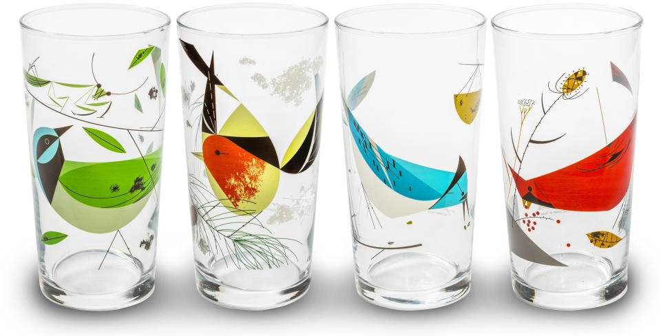 This image provided by Charley Harper Art Studio shows a set of glassware. Illustrator Charley Harper's iconic modern interpretations of nature's flora and fauna have an ardent fan base. His birds are especially striking. (Charley Harper Art Studio/Ross van Pelt Photography via AP)