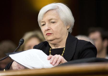 Janet Yellen, President Barack Obama's nominee to lead the U.S. Federal Reserve, prepares to testify at her U.S. Senate Banking Committee confirmation hearing in Washington November 14, 2013. REUTERS/Joshua Roberts