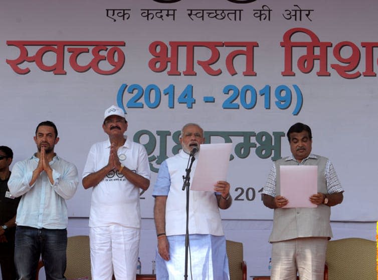 <span class="caption">Narendra Modi launching Swachh Bharat.</span> <span class="attribution"><a class="link " href="https://commons.wikimedia.org/w/index.php?curid=35998908" rel="nofollow noopener" target="_blank" data-ylk="slk:M Asokan/Wikimedia Commons;elm:context_link;itc:0;sec:content-canvas">M Asokan/Wikimedia Commons</a>, <a class="link " href="http://creativecommons.org/licenses/by-sa/4.0/" rel="nofollow noopener" target="_blank" data-ylk="slk:CC BY-SA;elm:context_link;itc:0;sec:content-canvas">CC BY-SA</a></span>