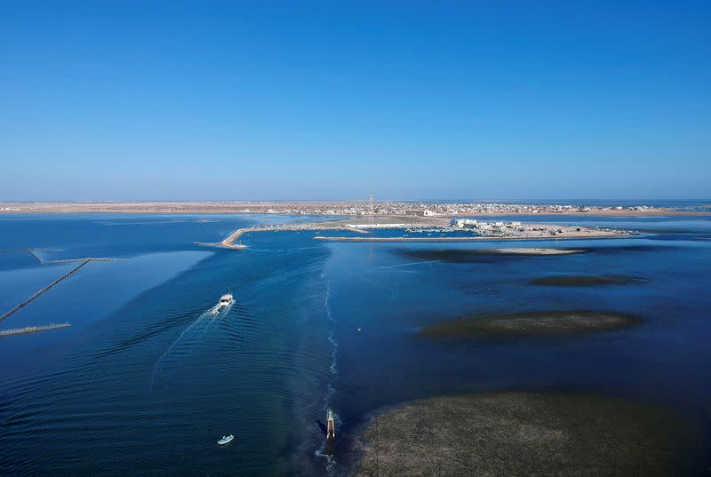 Boats enter Al Ataya Port in Kerkennah Islands