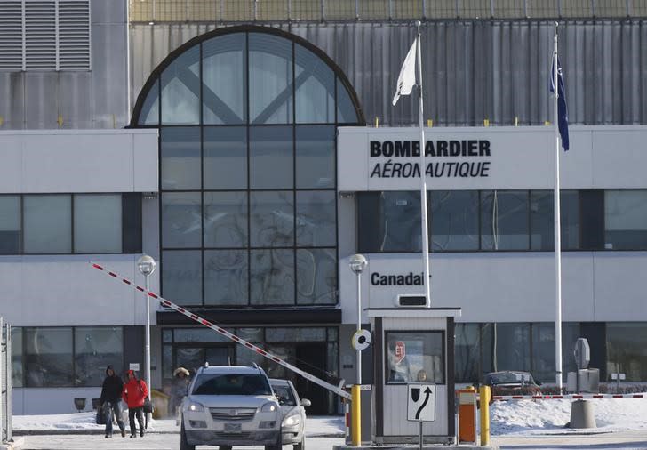 Employees leave work at a Bombardier plant in Montreal, in a file photo. REUTERS/Christinne Muschi