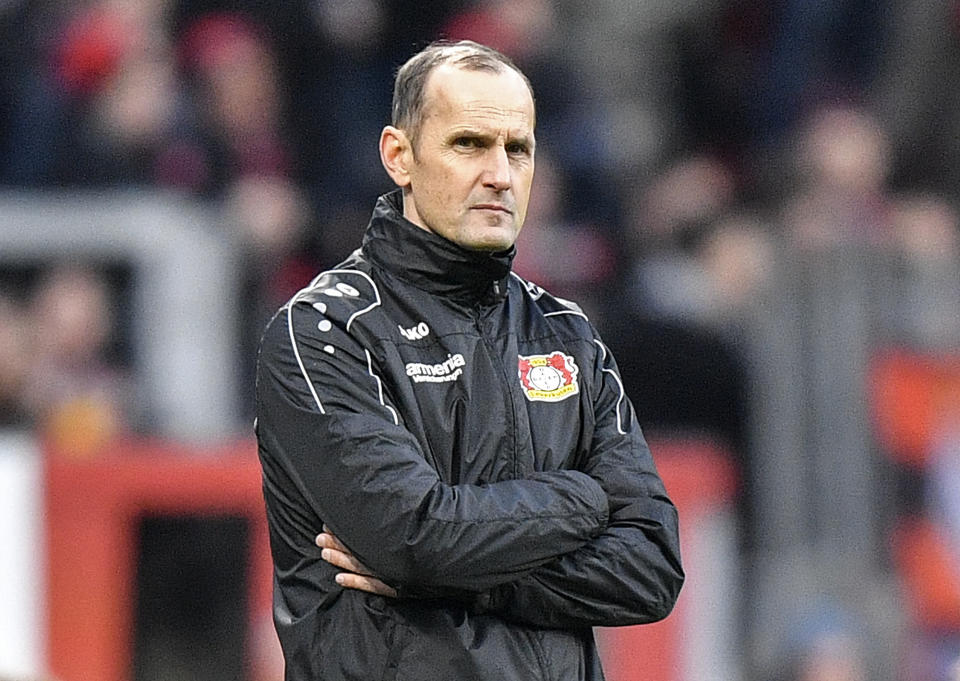 Leverkusen's coach Heiko Herrlich attends the German Bundesliga soccer match between Bayer Leverkusen and Hertha BSC Berlin in Leverkusen, Germany, Saturday, Dec. 22, 2018. Herrlich was dismissed on Sunday and will be replaced by Dutch coach Peter Bosz. (AP Photo/Martin Meissner)